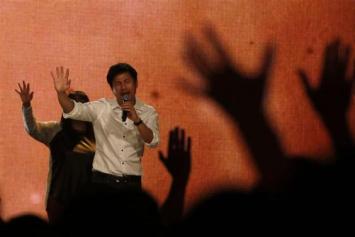 Worshippers attend a church service at the City Harvest Church in Singapore
